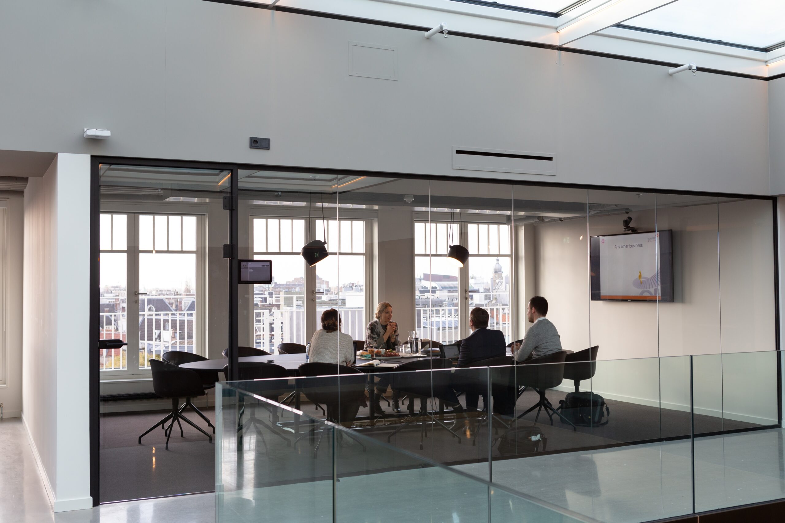 A group of colleagues having a business meeting in an office meeting room